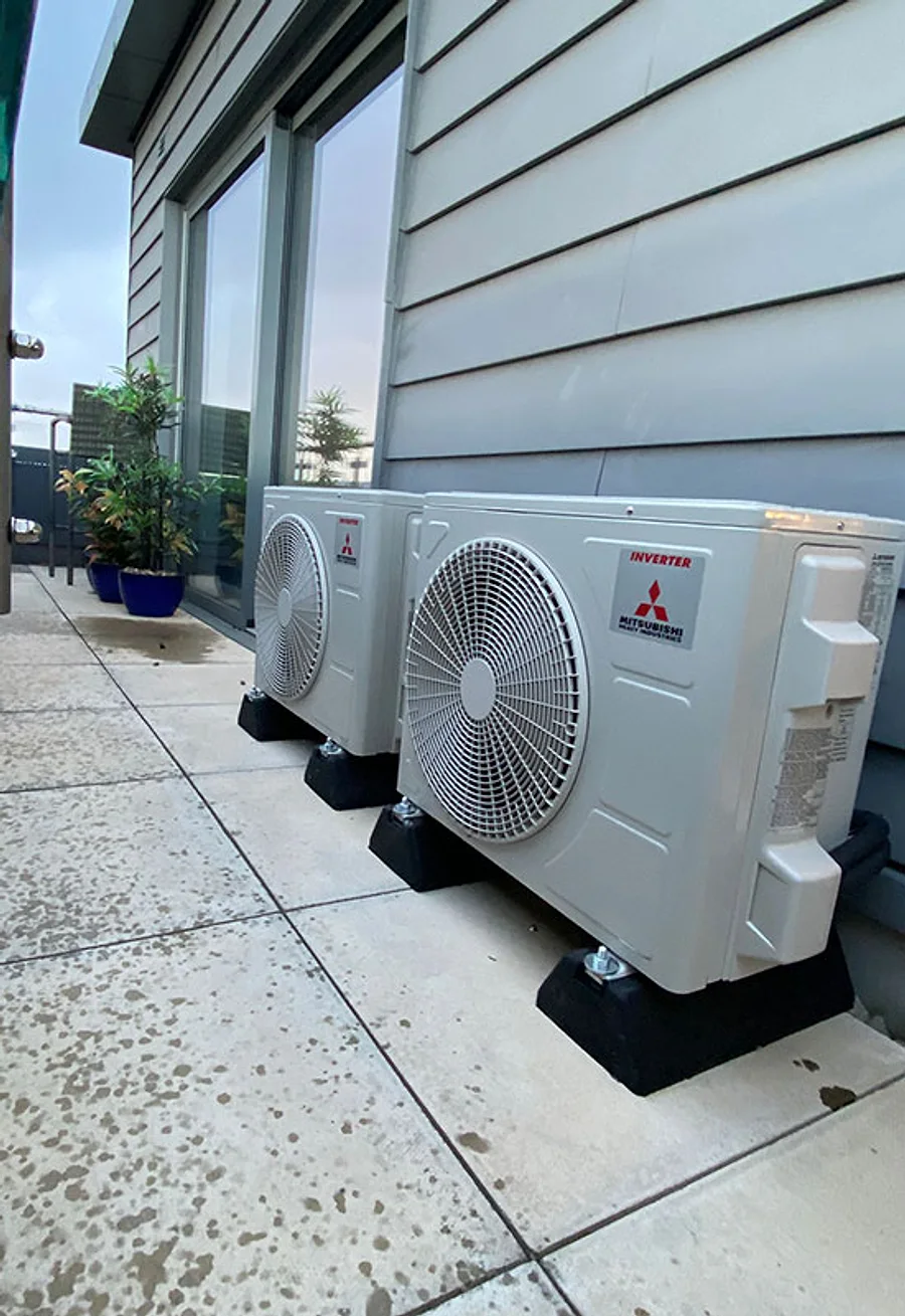 Two outdoor air-conditioning units on a genuine LongLife installation